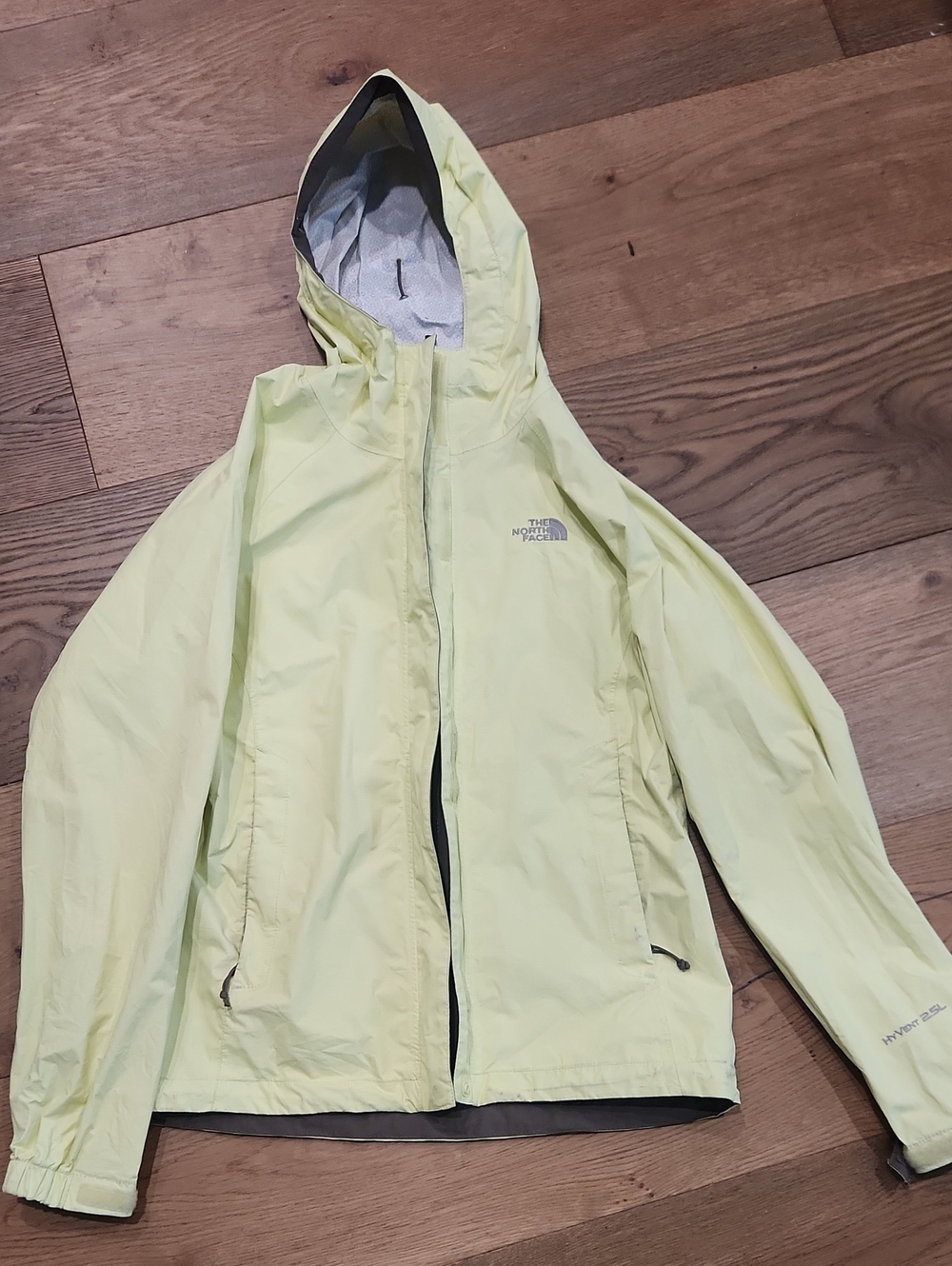 The North Face Women's Hooded Rain Jacket in Bright Yellow